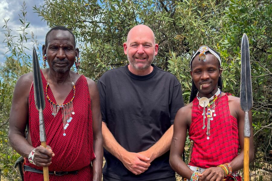 wildlife photographer Alan Hewitt with askari in Maasai Mara