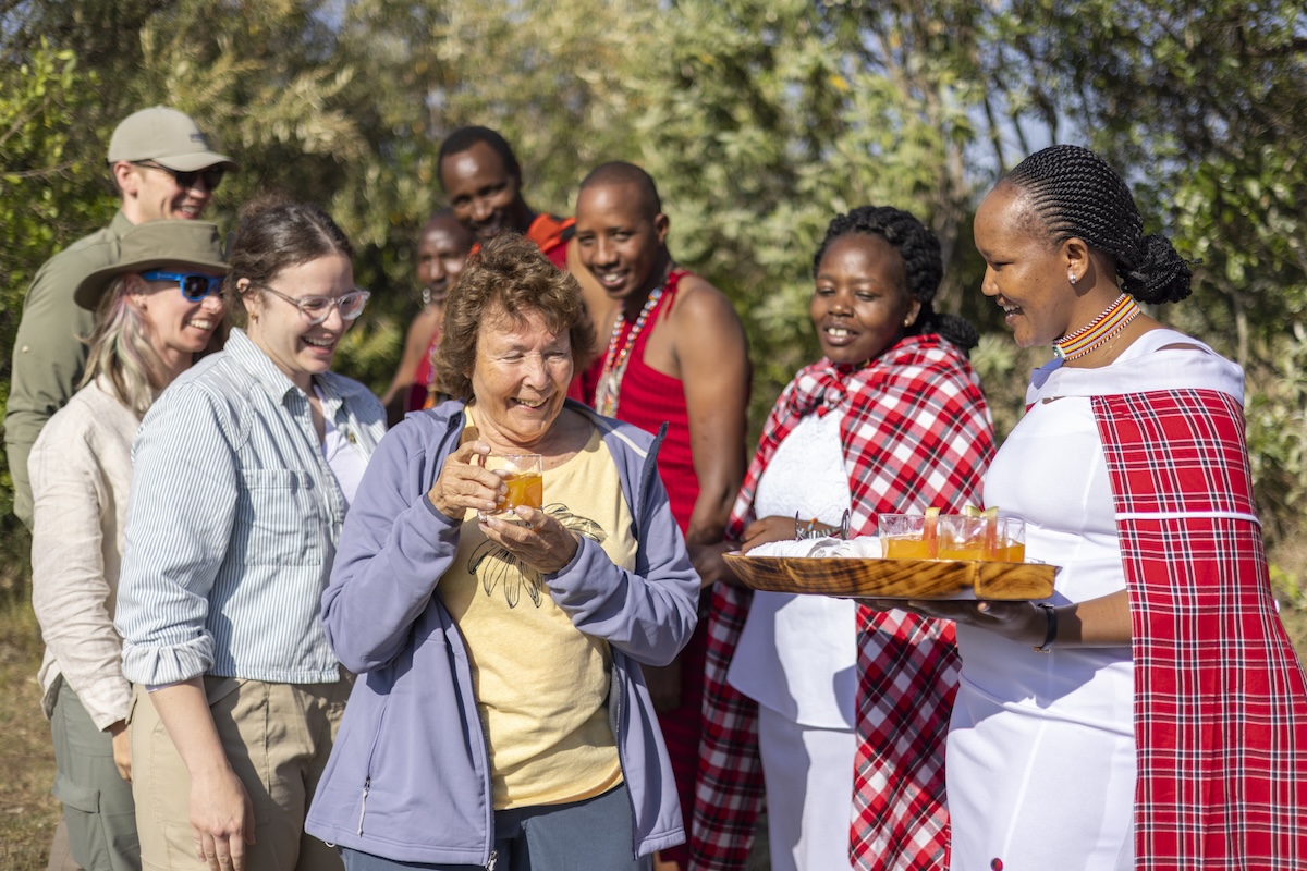 Welcome drinks at Mattikoko, a Maasai-owned safari camp in the Maasai Mara